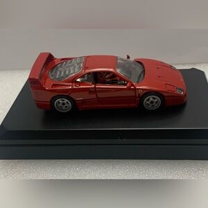 Ferrari Red Diecast Model on Black Base